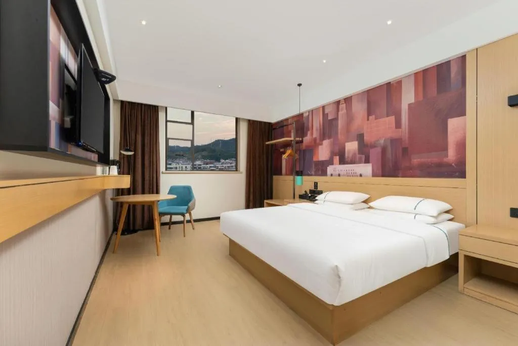 Bed in City Comfort Inn Shiyan Wudang Mountain