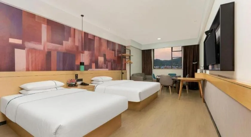 Bed in City Comfort Inn Shiyan Wudang Mountain