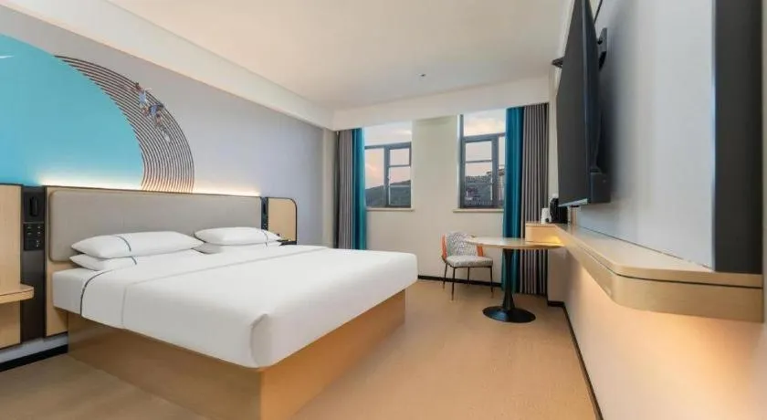 Bed in City Comfort Inn Shiyan Wudang Mountain