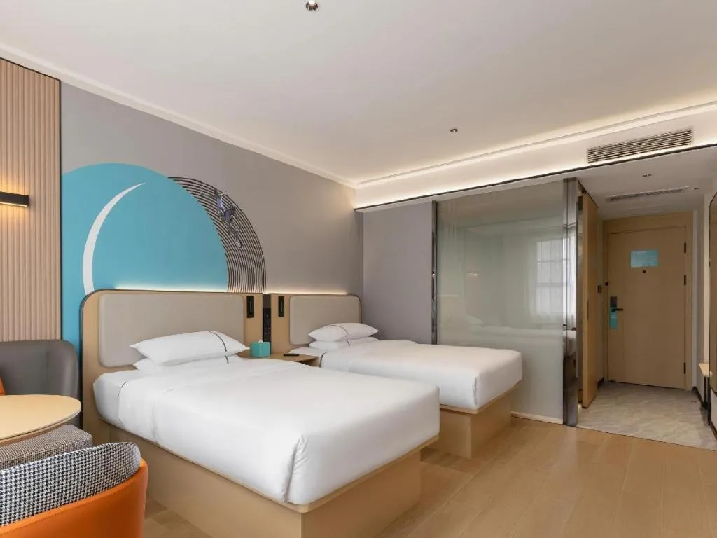 Bed in City Comfort Inn Shiyan Wudang Mountain