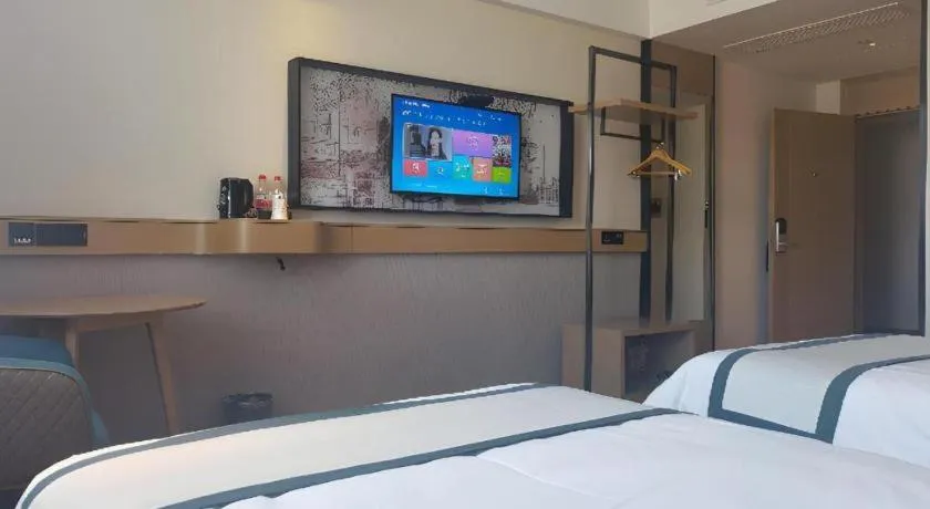 Bed in City Comfort Inn Shiyan Wudang Mountain