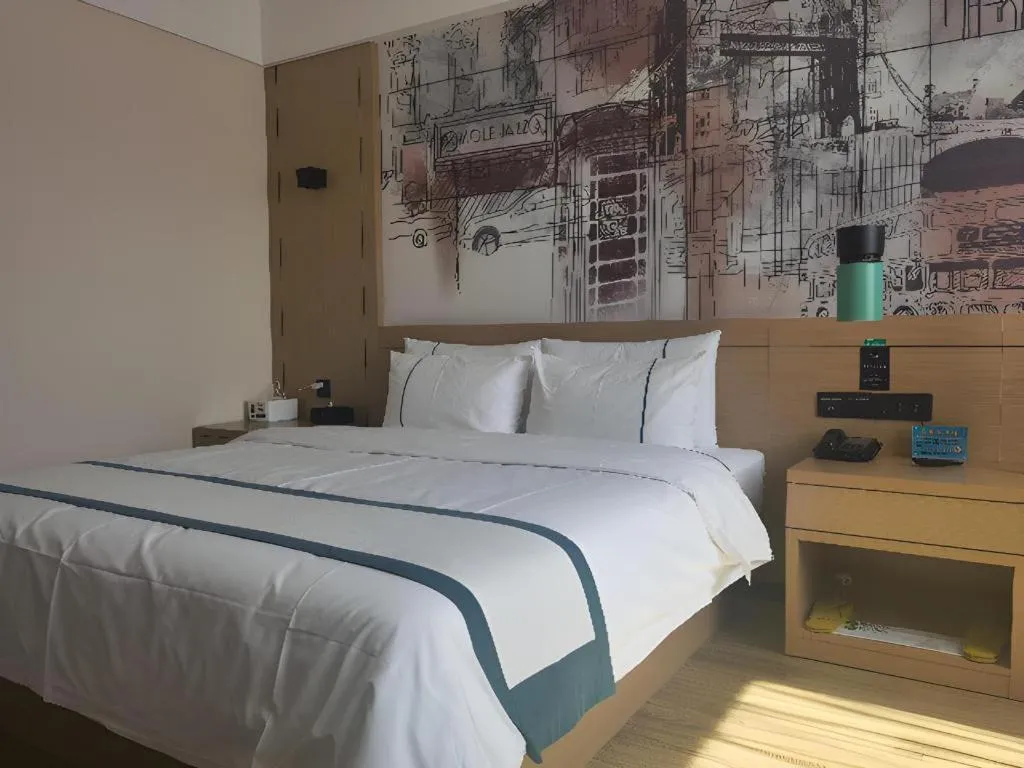 Bed in City Comfort Inn Shiyan Wudang Mountain