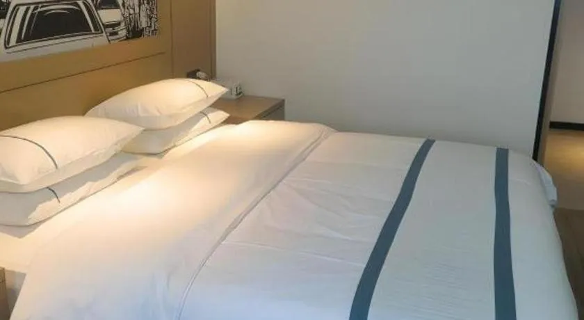 Bed in City Comfort Inn Shiyan Wudang Mountain