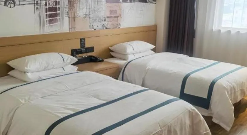 Bed in City Comfort Inn Shiyan Wudang Mountain