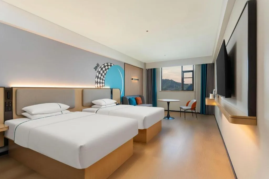 Bed in City Comfort Inn Shiyan Wudang Mountain