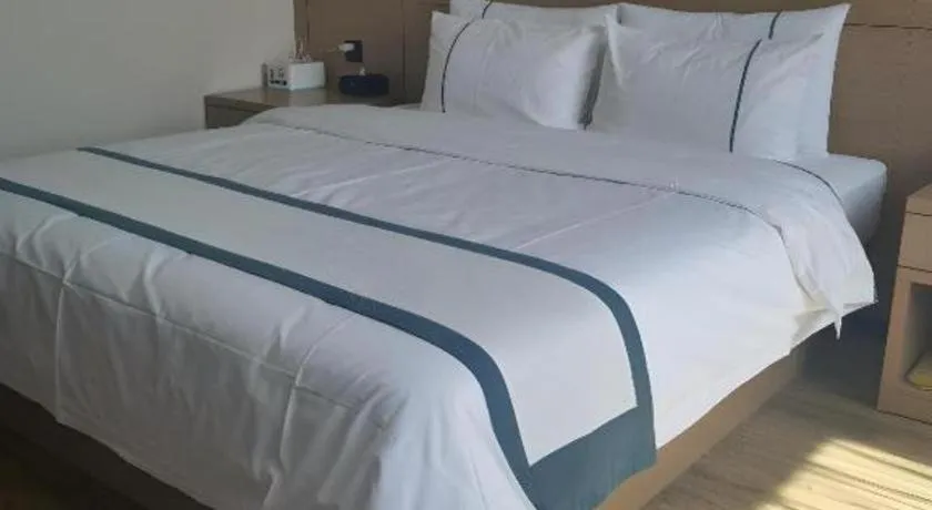 Bed in City Comfort Inn Shiyan Wudang Mountain