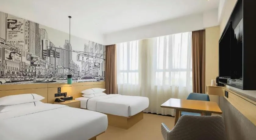 Bed in City Comfort Inn Shiyan Wudang Mountain