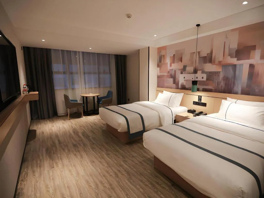 Bed in City Comfort Inn Fuchuan Fenghuang Road