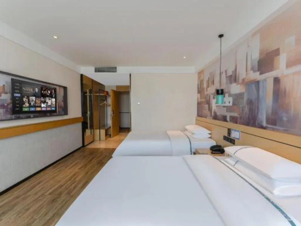 Bed in City Comfort Inn Fuchuan Fenghuang Road