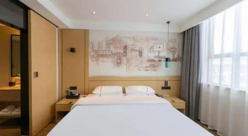 Bed in City Comfort Inn Fuchuan Fenghuang Road Bed in City Comfort Inn Fuchuan Fenghuang Road