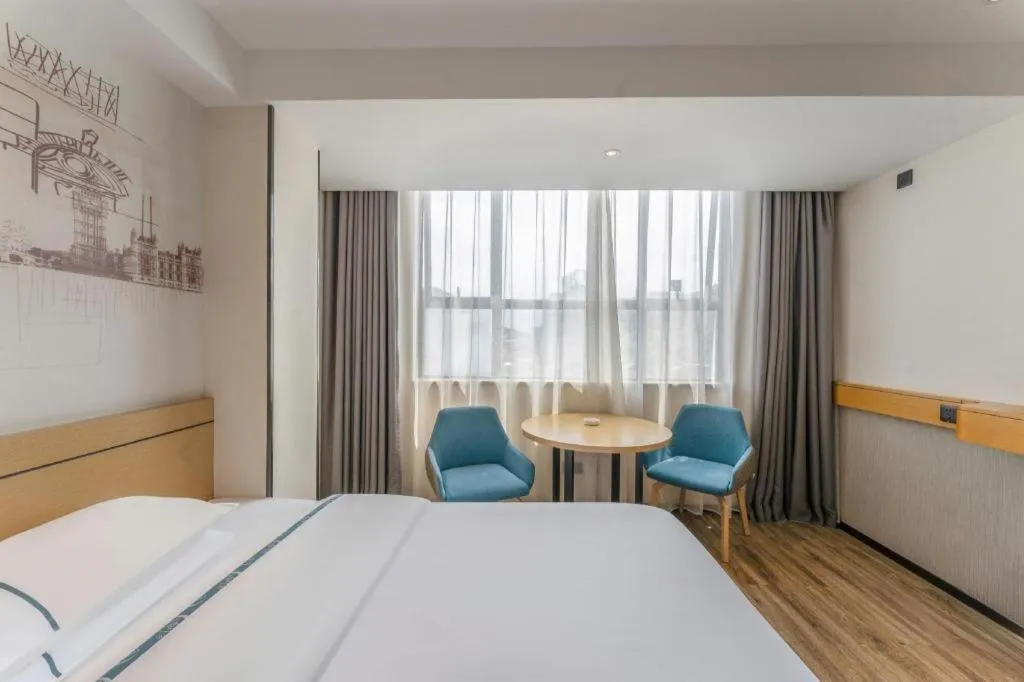 Bed in City Comfort Inn Fuchuan Fenghuang Road