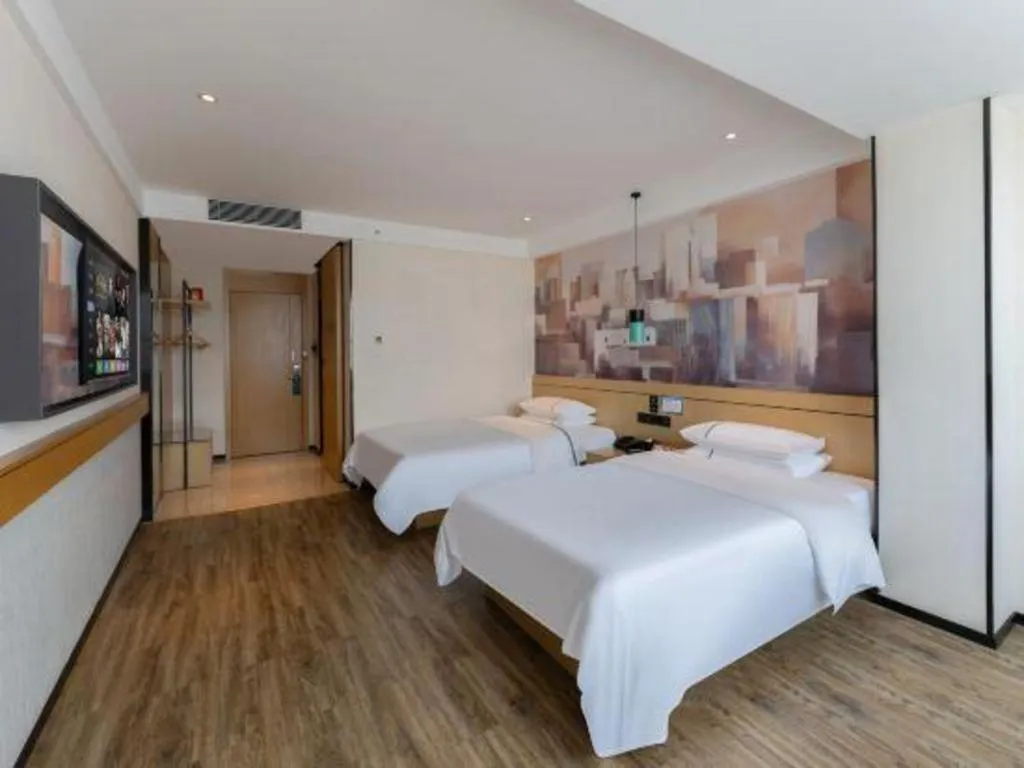 Bed in City Comfort Inn Fuchuan Fenghuang Road