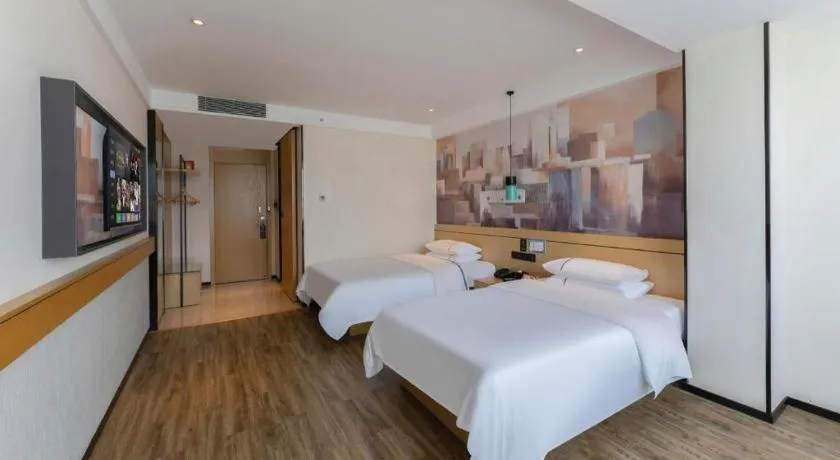 Bed in City Comfort Inn Fuchuan Fenghuang Road