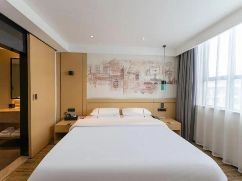 Bed in City Comfort Inn Fuchuan Fenghuang Road