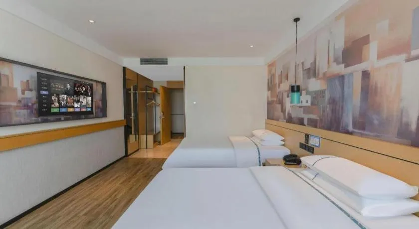 Bed in City Comfort Inn Fuchuan Fenghuang Road