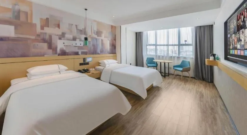 Bed in City Comfort Inn Fuchuan Fenghuang Road