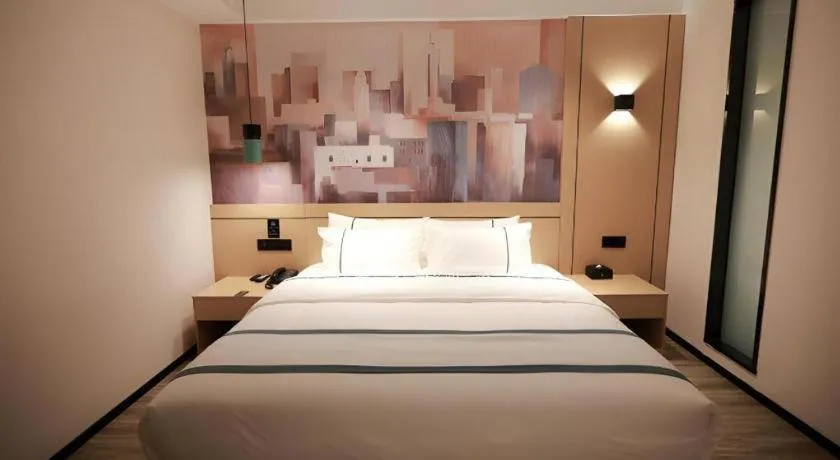 Bed in City Comfort Inn Fuchuan Fenghuang Road