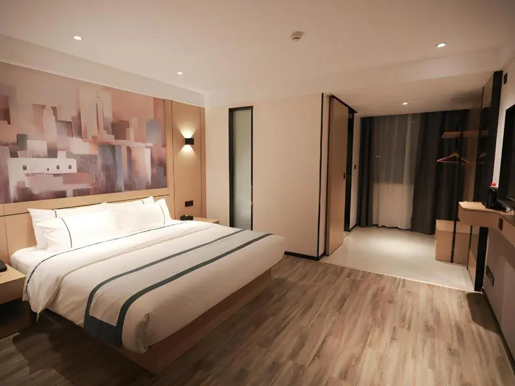 Bed in City Comfort Inn Fuchuan Fenghuang Road Bed in City Comfort Inn Fuchuan Fenghuang Road