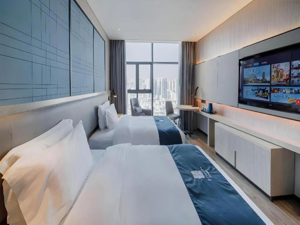 Bed in Echarm Hotel Nanning Dongge Macun Metro Station