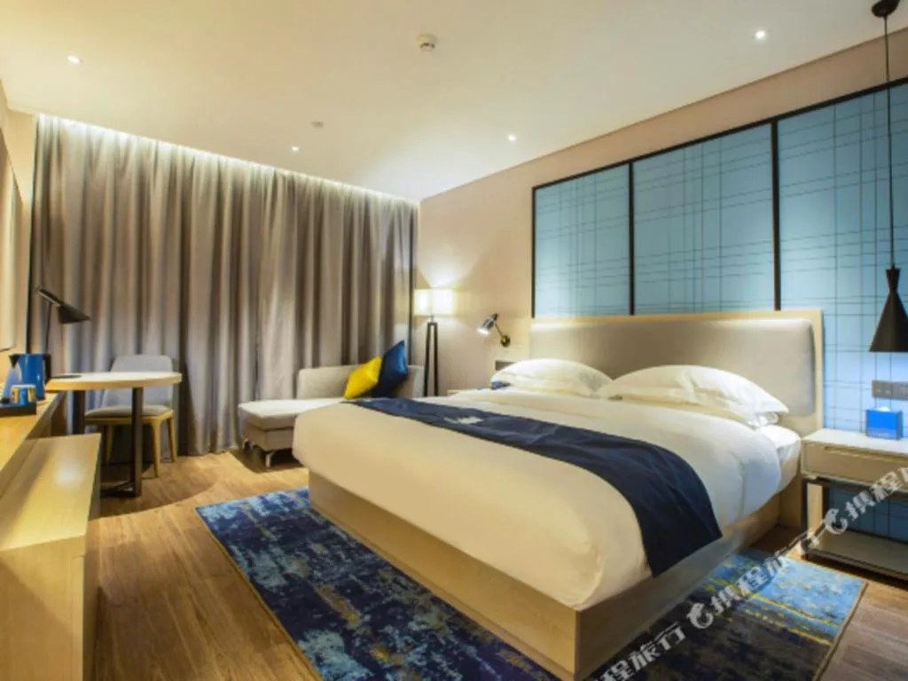 Bed in Echarm Hotel Nanning Dongge Macun Metro Station