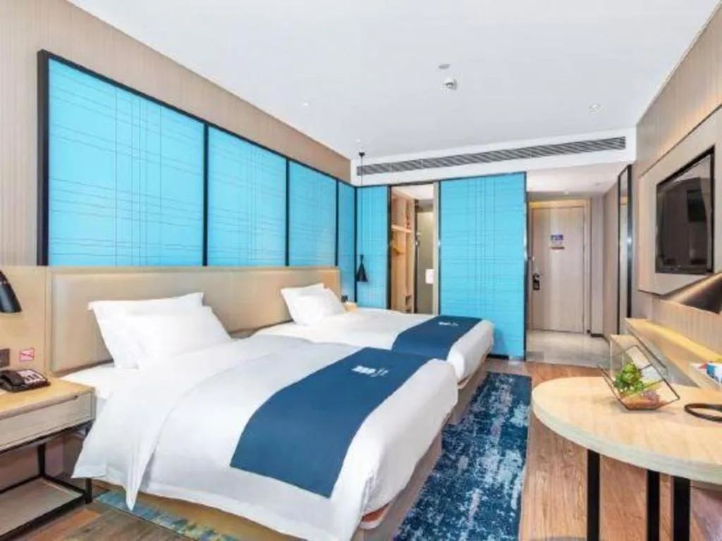 Bed in Echarm Hotel Nanning Dongge Macun Metro Station