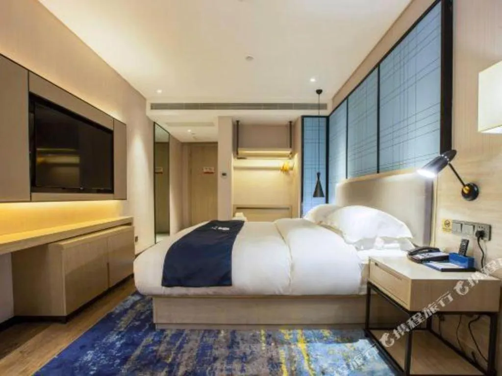 Bed in Echarm Hotel Nanning Dongge Macun Metro Station
