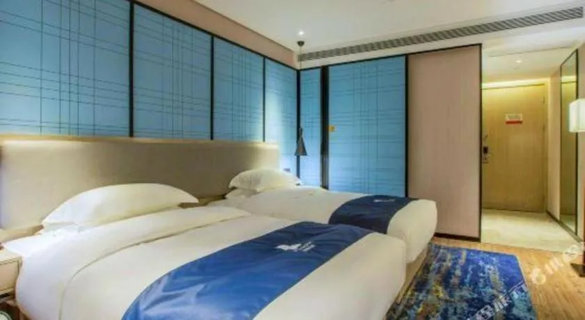 Bed in Echarm Hotel Nanning Dongge Macun Metro Station