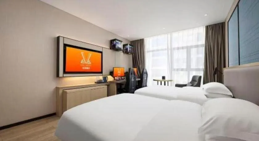 Bed in Echarm Hotel Nanning Dongge Macun Metro Station