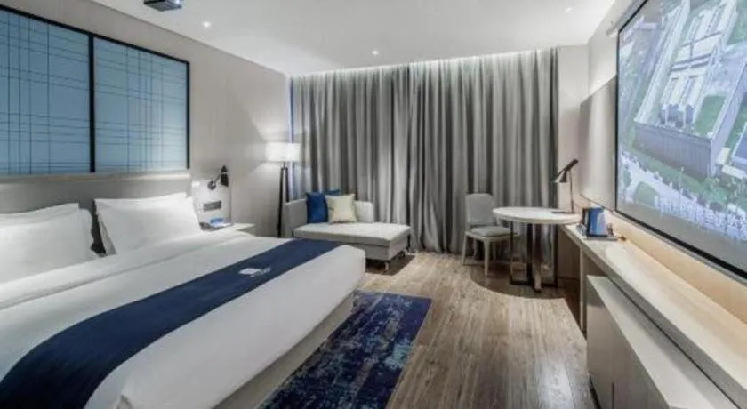 Bed in Echarm Hotel Nanning Dongge Macun Metro Station