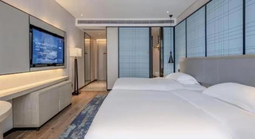 Bed in Echarm Hotel Nanning Dongge Macun Metro Station