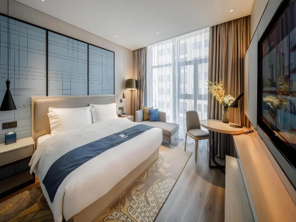 Bed in Echarm Hotel Nanning Dongge Macun Metro Station