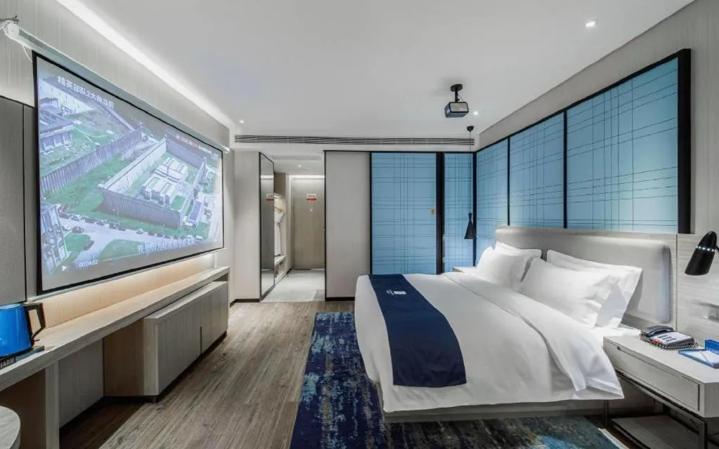 Bed in Echarm Hotel Nanning Dongge Macun Metro Station