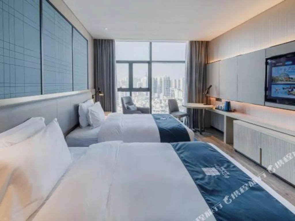 Bed in Echarm Hotel Nanning Dongge Macun Metro Station