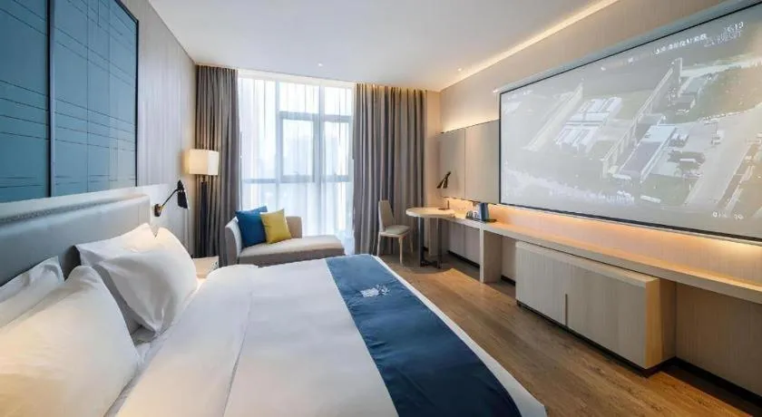 Bed in Echarm Hotel Nanning Dongge Macun Metro Station