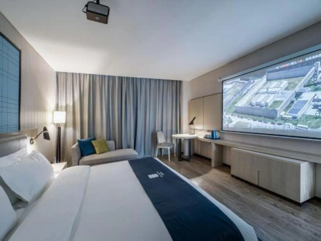 Bed in Echarm Hotel Nanning Dongge Macun Metro Station