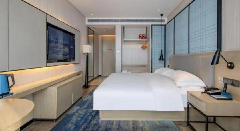 Bed in Echarm Hotel Nanning Dongge Macun Metro Station