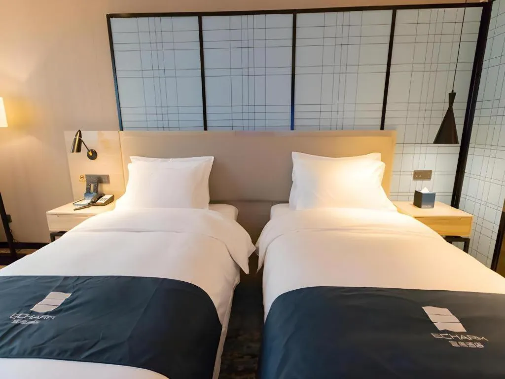 Bed in Echarm Hotel Nanning Dongge Macun Metro Station