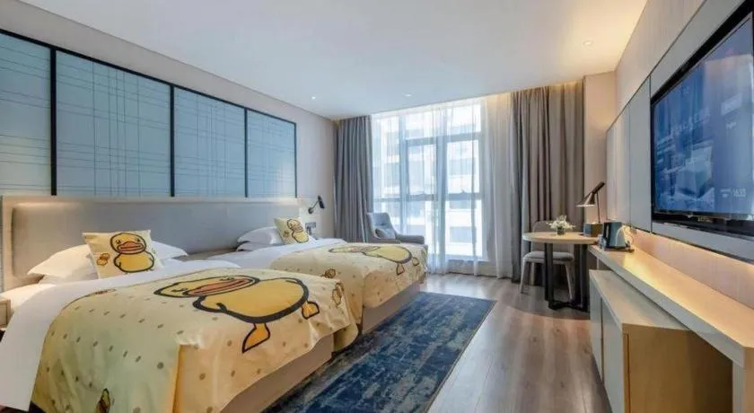 Bed in Echarm Hotel Nanning Dongge Macun Metro Station