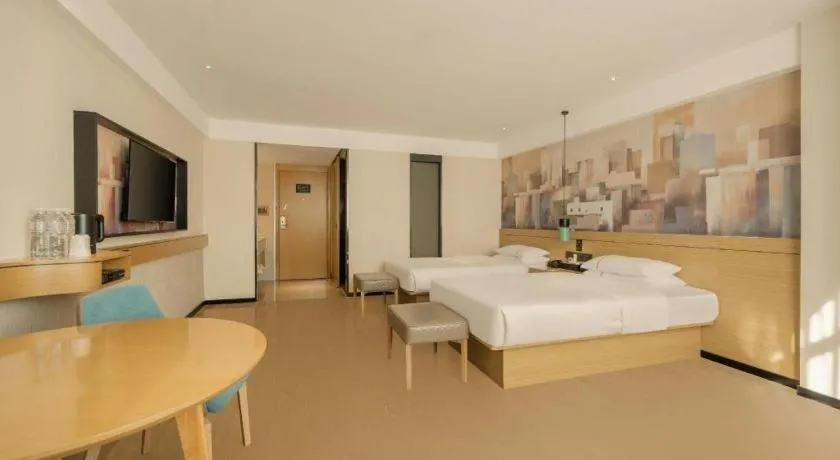 Bed in City Comfort Inn Wuzhou High-speed Railway Station Canghai Lake Park