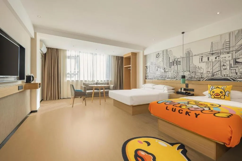 Bed in City Comfort Inn Wuzhou High-speed Railway Station Canghai Lake Park