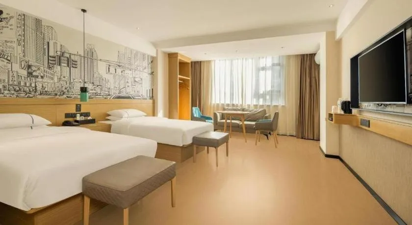 Bed in City Comfort Inn Wuzhou High-speed Railway Station Canghai Lake Park