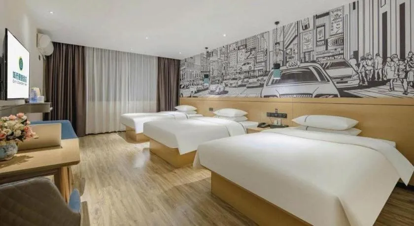 Bed in City Comfort Inn Wuzhou High-speed Railway Station Canghai Lake Park