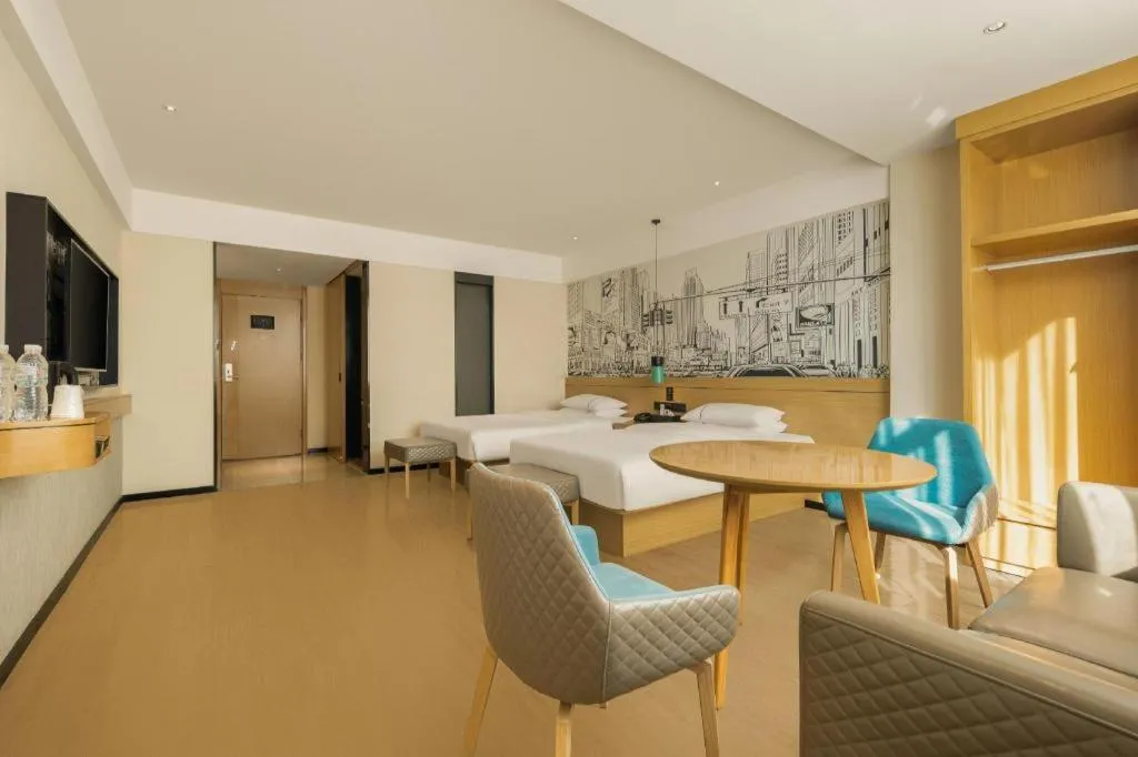 Bed in City Comfort Inn Wuzhou High-speed Railway Station Canghai Lake Park