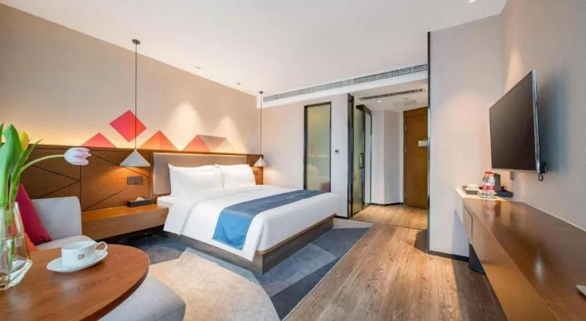 Bed in Borrman Hotel Ji'nan Aoti Center East Provincial Hospital