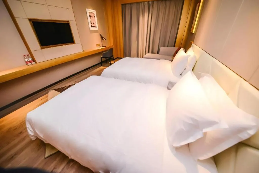 Bed in Borrman Hotel Ji'nan Aoti Center East Provincial Hospital