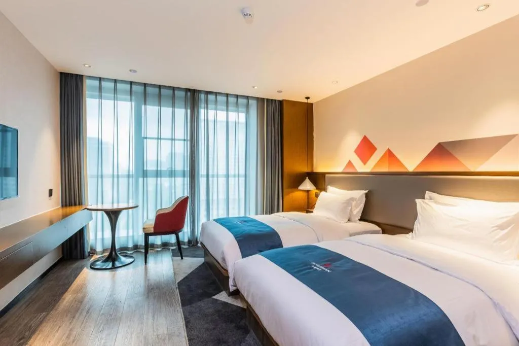 Bed in Borrman Hotel Ji'nan Aoti Center East Provincial Hospital