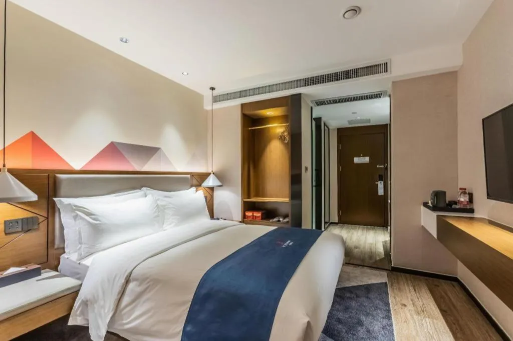 Bed in Borrman Hotel Ji'nan Aoti Center East Provincial Hospital