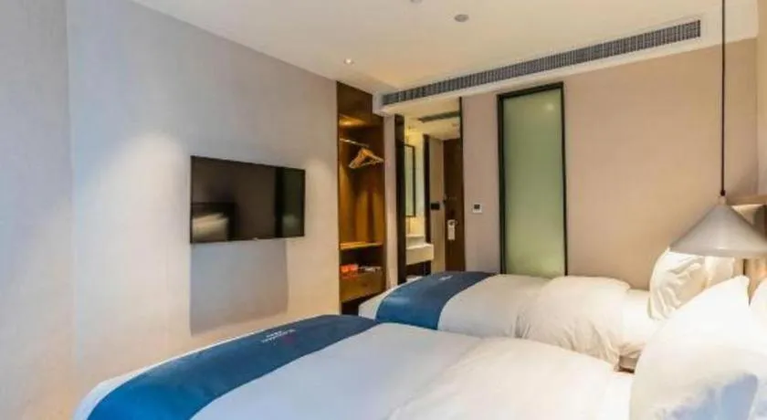 Bed in Borrman Hotel Ji'nan Aoti Center East Provincial Hospital