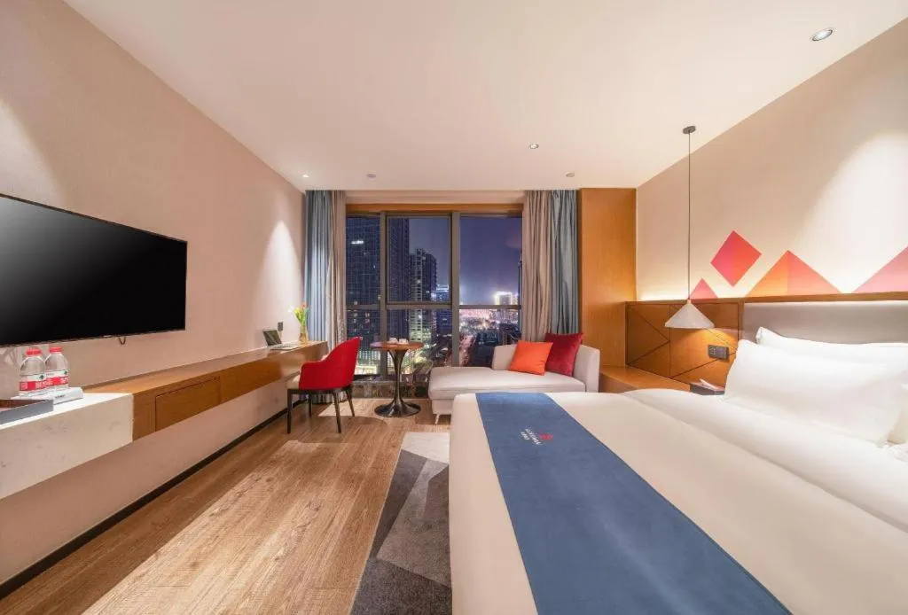 Bed in Borrman Hotel Ji'nan Aoti Center East Provincial Hospital