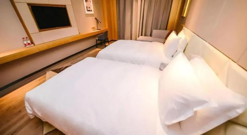 Bed in Borrman Hotel Ji'nan Aoti Center East Provincial Hospital